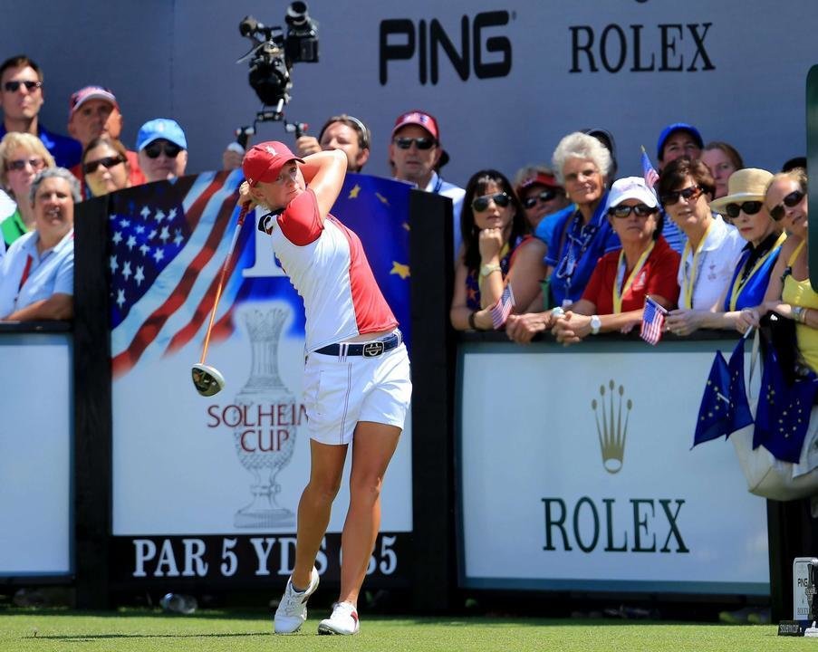 PARKER, CO - AUGUST 18:  Stacy Lewis of the USA plays her opening tee shot at the first hole during the final day singles matches in the 2013 Solheim Cup at The Colorado Golf Club on August 18, 2013 in Parker, Colorado.  (Photo by David Cannon/Getty Images)